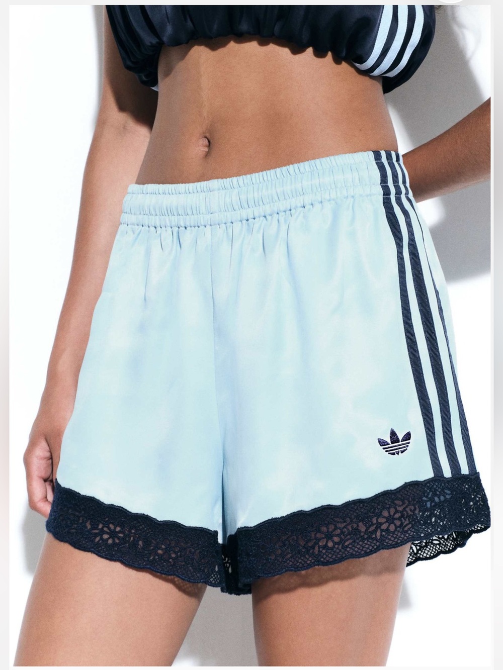 adidas Originals × ASOS shorts with lace hem in pale blue